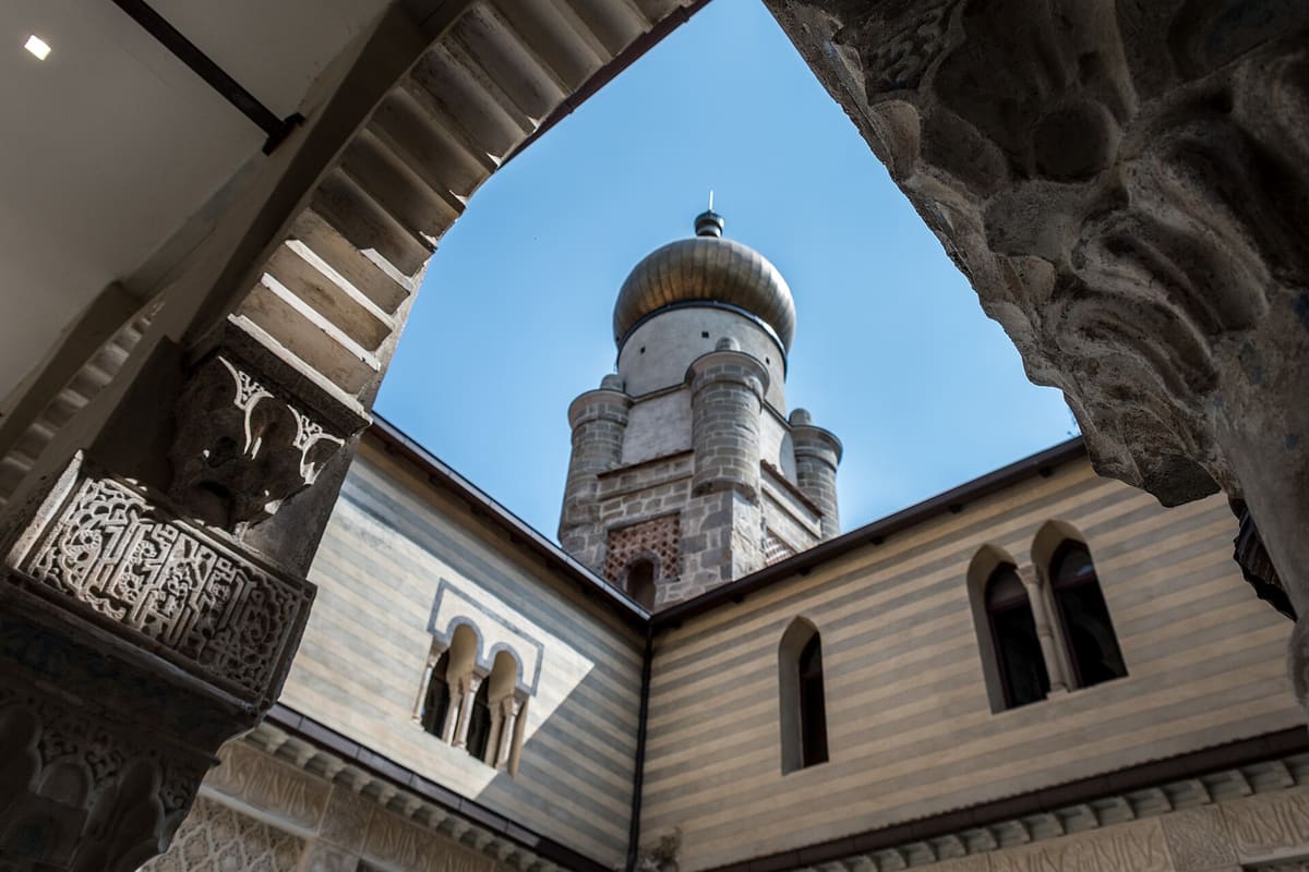 The courtyard and tower of Rocchetta Mattei in Grizzana Morandi