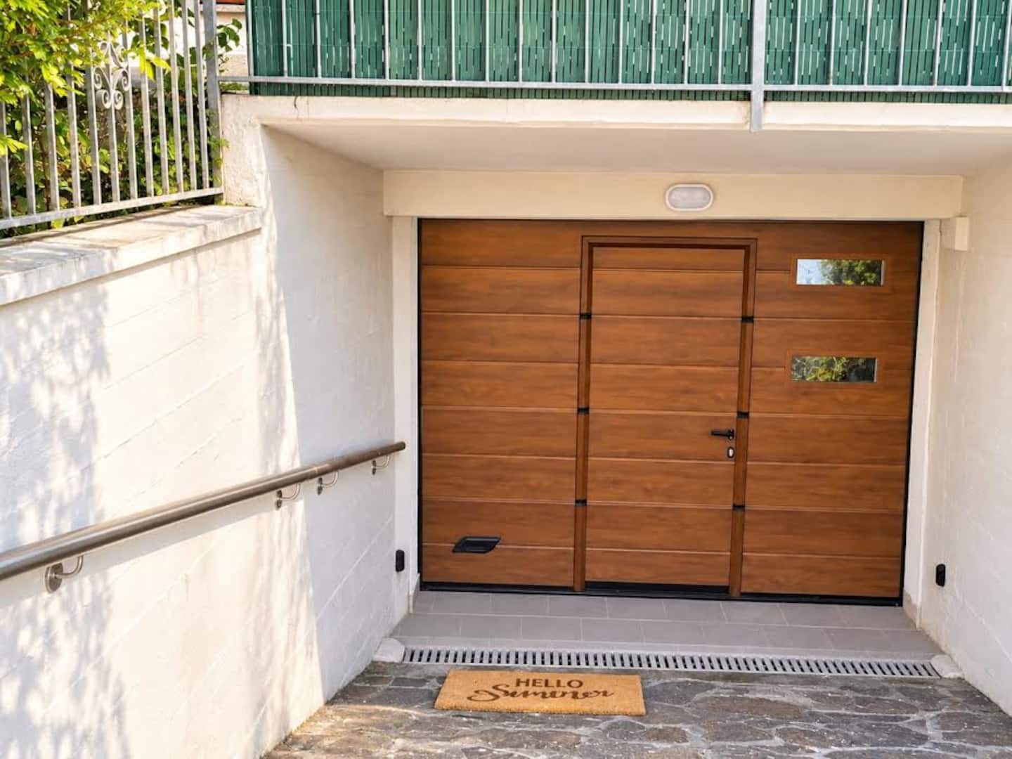 The garage entrance with its wooden door