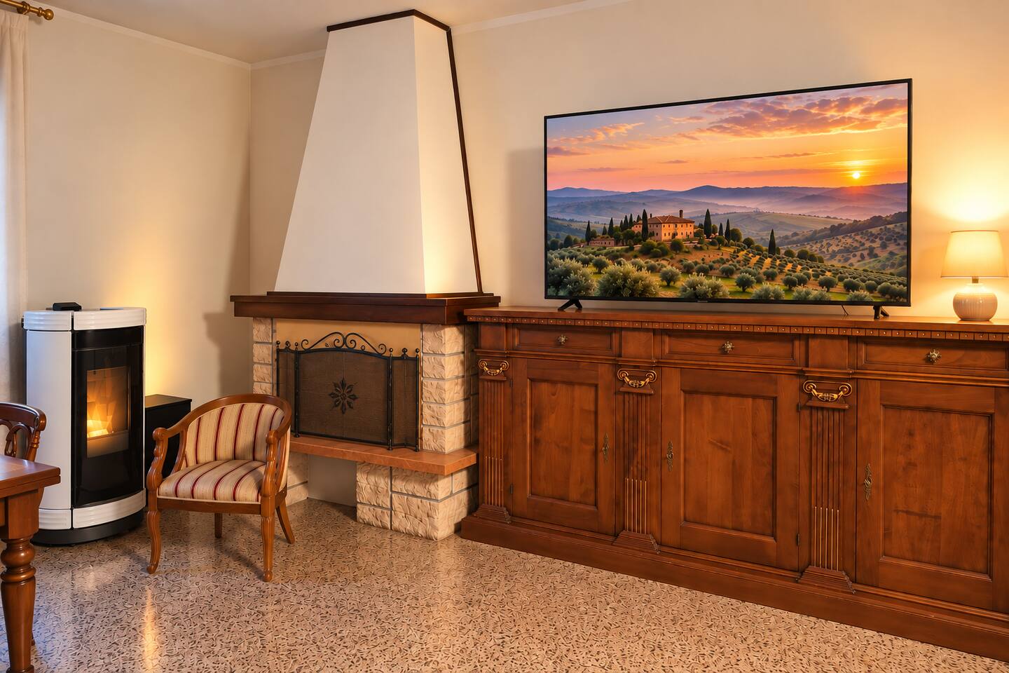 The fireplace, pellet stove and TV in the upper-floor lounge