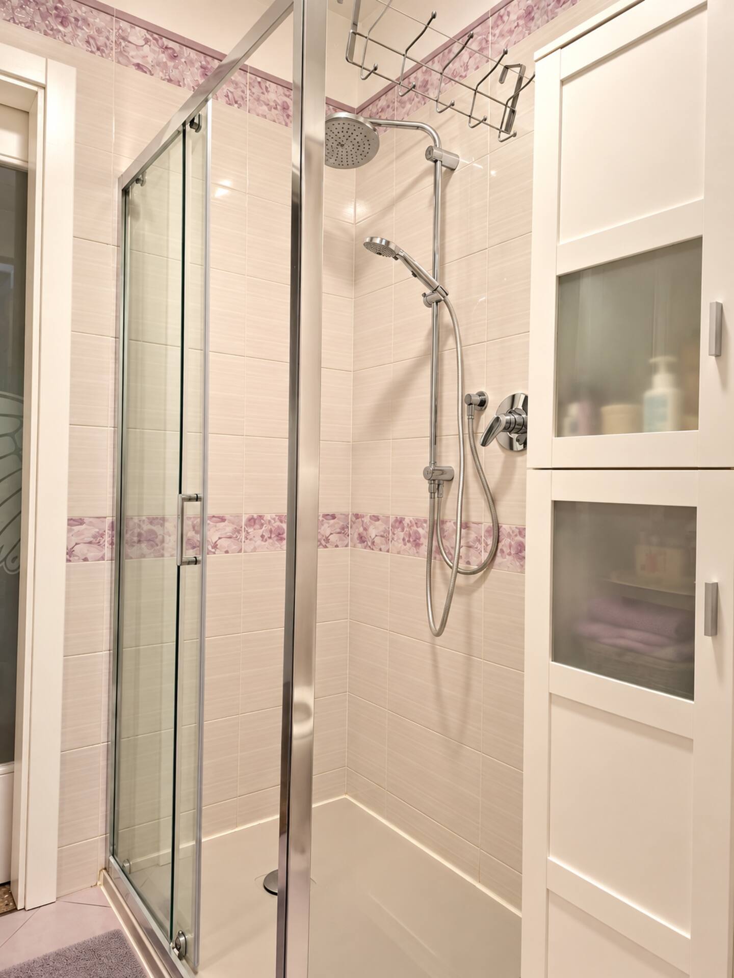 The shower in the upper-floor bathroom
